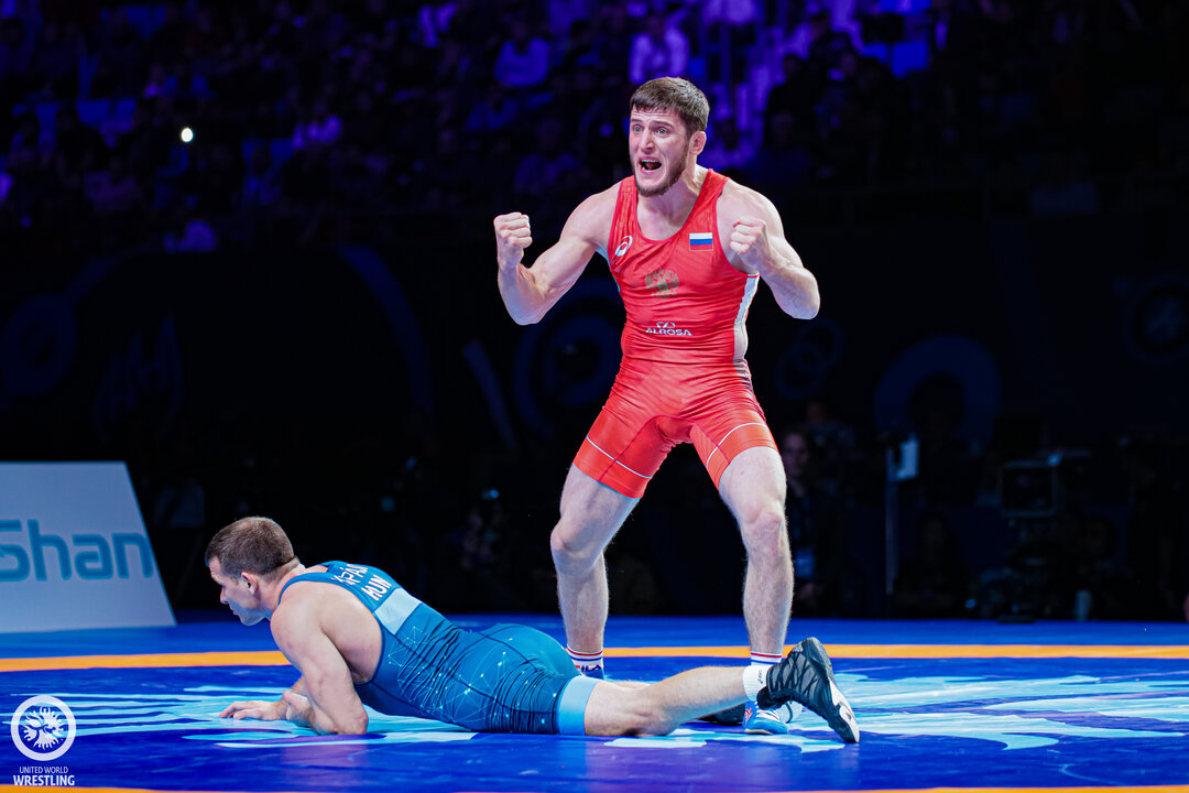 Wrestling championships. United World Wrestling магазин. Всемирный день спортивной борьбы 23 мая. Леонид Базан борец. United World Wrestling цвета.